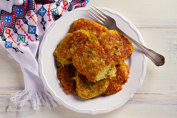 Potato Cakes. Vegetable fritters, latkes, draniki. Vegetable pancakes. horizontal, overhead