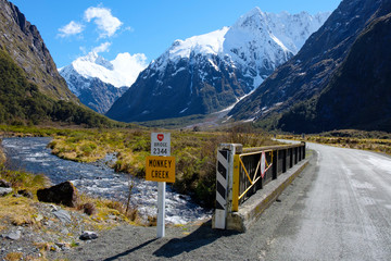 View of bridge and mountains from Monkey Creek, Fjordland, South Island, New Zealand. State Highway 94.