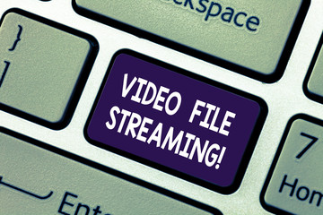 Conceptual hand writing showing Video File Streaming. Business photo showcasing video be viewed online without being downloaded Keyboard key Intention to create computer message idea