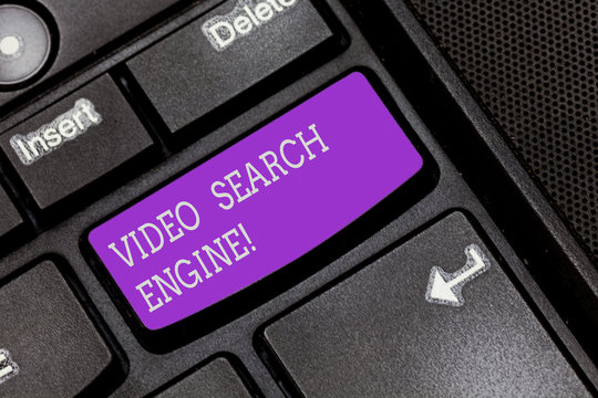 Text sign showing Video Search Engine. Conceptual photo which crawls web deeply for media and audio content Keyboard key Intention to create computer message pressing keypad idea