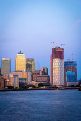 Fototapeta premium A view on the Thames River and Canary Wharf in London, UK