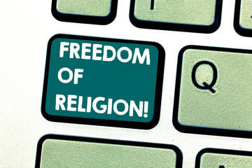 Handwriting text Freedom Of Religion. Concept meaning right to practise whatever religion one chooses Keyboard key Intention to create computer message pressing keypad idea