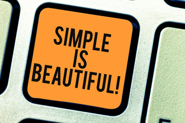 Fototapeta premium Conceptual hand writing showing Simple Is Beautiful. Business photo showcasing you do not have to cover under makeup be natural Keyboard key Intention to create computer message idea