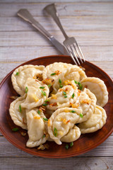 Dumplings, filled with potato. Dumplings with filling. vertical