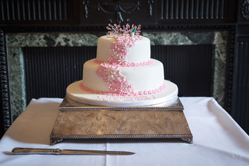 White wedding cake with delicate floral design
