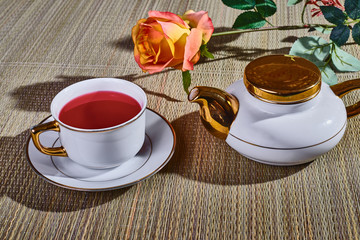 Teapot Cup tea over them rose flower