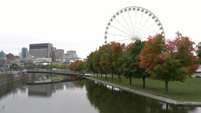 Beautiful fall color with the La Grande Roue de Montreal observation ferris wheel