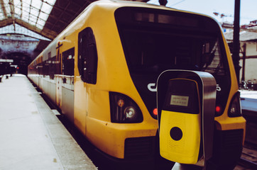 Porto, Portugal - 30 April, 2016 : Yellow and black train stop at railway station
