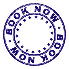 BOOK NOW stamp seal watermark with grunge texture. Designed with round shapes and stars. Blue vector rubber print of BOOK NOW title with grunge texture.