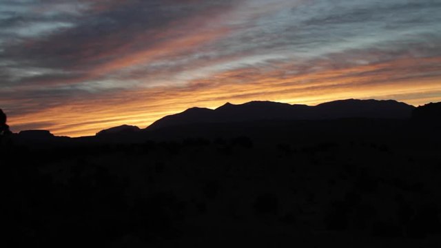 A time lapse of the light of dawn over the Waterpocket Fold in Capitol Reef National Park in Utah.