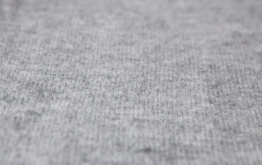 Fototapeta na wymiar Textured dark gray fabric for the background fabric