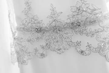 White wedding dress hanging up before the wedding
