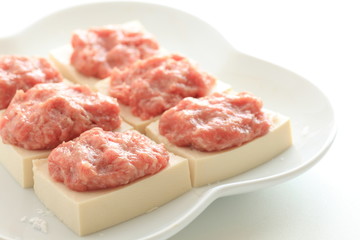 Chinese cooking, prepared mince meat on tofu