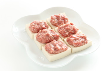 Chinese cooking, prepared mince meat on tofu
