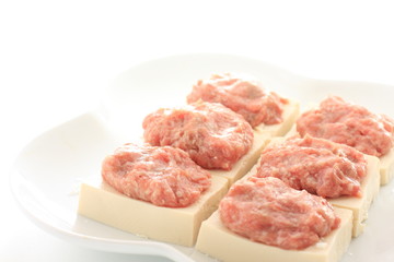Chinese cooking, prepared mince meat on tofu