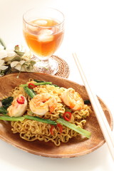 Chinese food, shrimp and green leaf vegetable fried noodles
