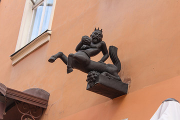 Figure of centaur with the mug of beer in a wall. Lviv. Ukraine.. - obrazy, fototapety, plakaty