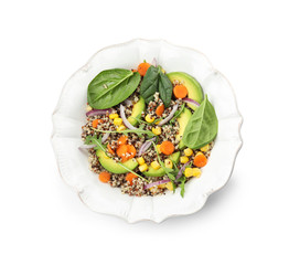 Plate of healthy quinoa salad with vegetables isolated on white, top view