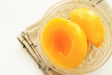 Canned food, peach and syrup