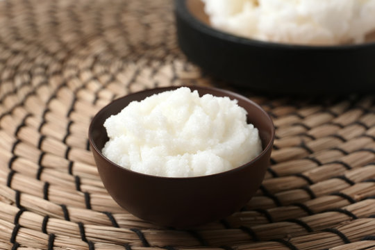 Shea Butter In Bowl On Wicker Mat, Closeup