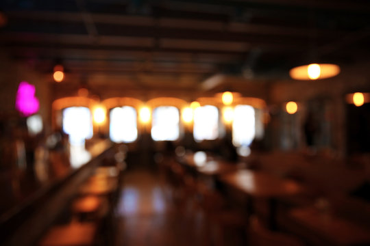 Blurred view of stylish modern restaurant interior