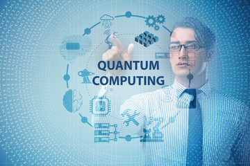 Businessman pressing virtual button in quantum computing concept