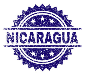 NICARAGUA stamp seal watermark with distress style. Blue vector rubber print of NICARAGUA caption with corroded texture.