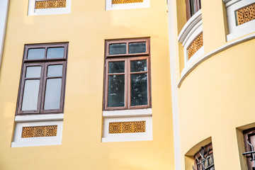Obraz premium Beautiful windows of the old house in the tourist area of Shamian, Guangzhou