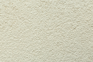 Light beige gray wall plaster background texture.