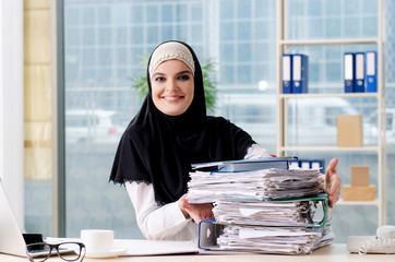 Woman muslim employee working in the office 