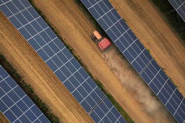 Aerial tractor when working under the solar photovoltaic panel