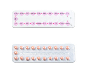 birth control pills on white background. 