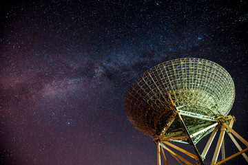 Radio telescopes and the Milky Way at night