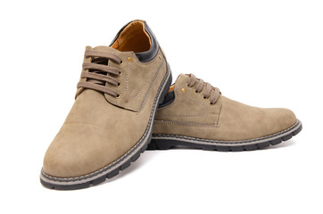 Brown suade shoes isolated on white background