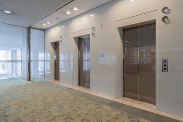 Office interior, hall with two elevators