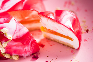 mousse cake with mango puree and cream