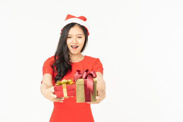 Photo of asian curious woman in red dress rejoicing her birthday or new year gift box. Young woman holding gift  box with red bow being excited and surprised  holiday present isolated white background