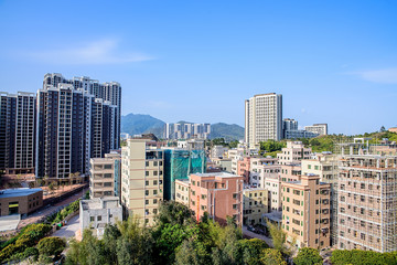 Fototapeta premium Real Estate Building and Chengzhong Village Building, Daya Bay District, Huizhou City, Guangdong Province