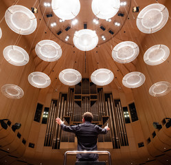 Looking up at conductor and lights