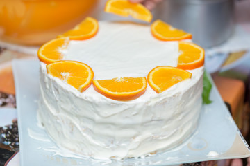 fruit cake with milk cream and fruit