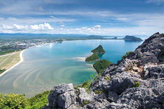 Beautiful blue sea and green island. Spiky rocks with city and beach at Prachuap Bay in the west side of the Gulf of Siam, aerial view from the Khao Lom Muak,(Prachuap Khiri Khan) Unseen Thailand