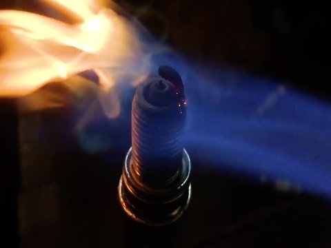 Close-up. Calcination of the spark plug.