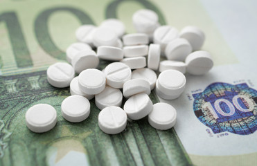 the pills and euro banknotes, medical abstract