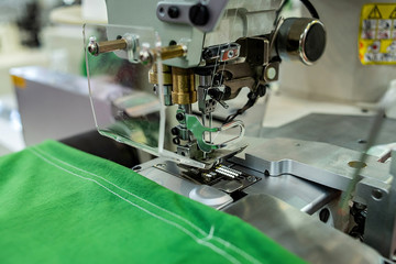 Automatic T-shirt hem machine