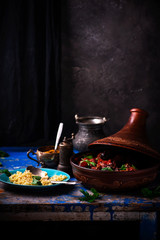 Tajin with lamb and dried fruits.style rustic