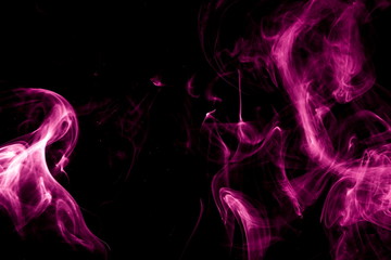 Purple smoke on black background