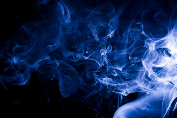 Obraz premium Blue smoke on black background