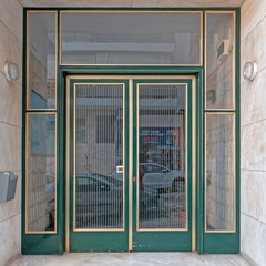 Greece Athens downtown, 60's elegant condominium entrance metallic green frame door