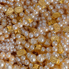 natural pearls neclaces closeup top view, precious background