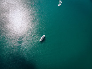 Amazing aerial view to two Yachts in deep blue sea. Drone photography